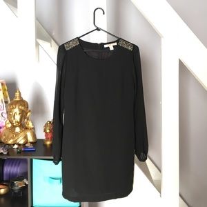 Black shirt dress with shoulder accent